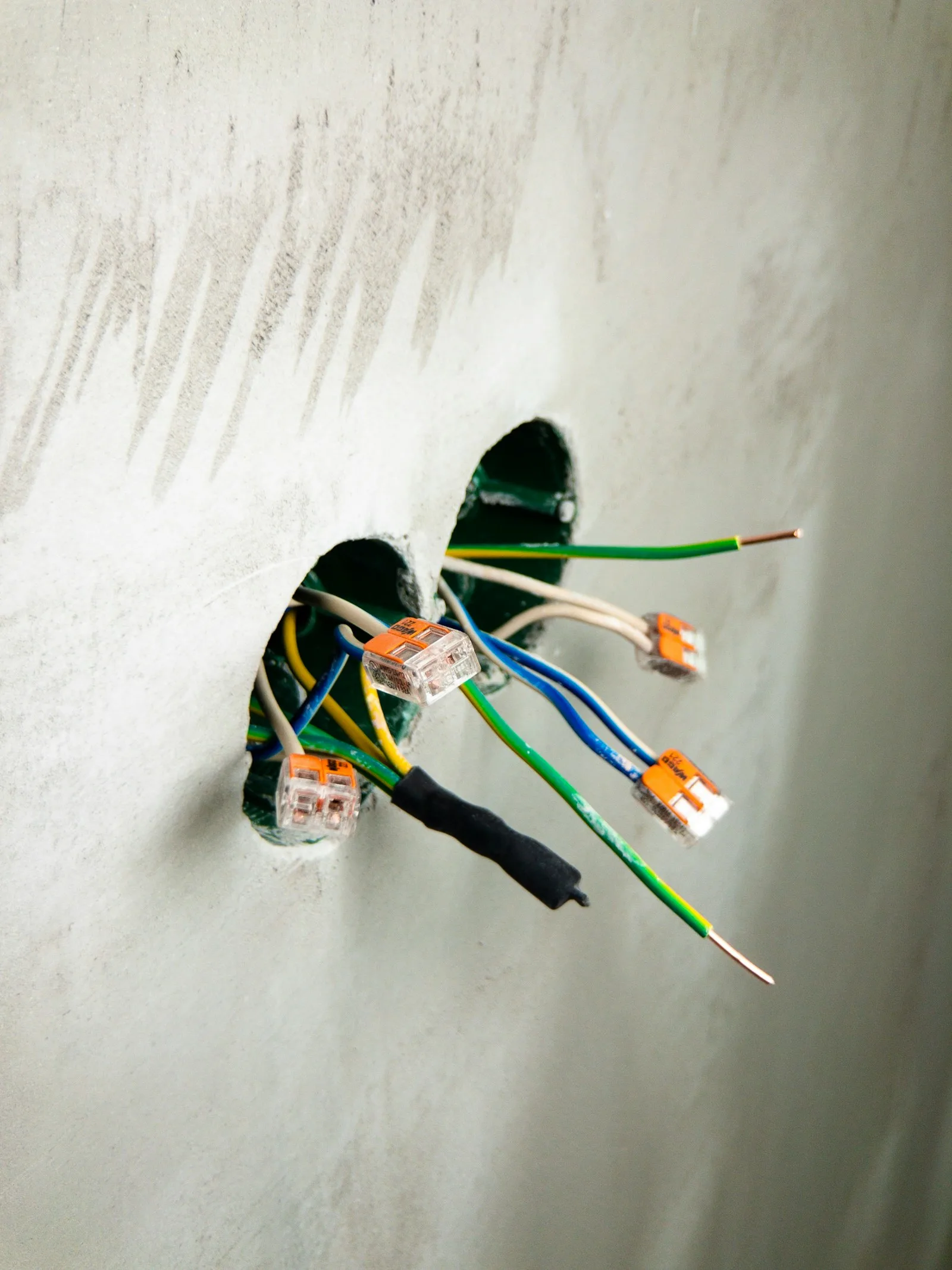 Exposed communications wiring inside a wall